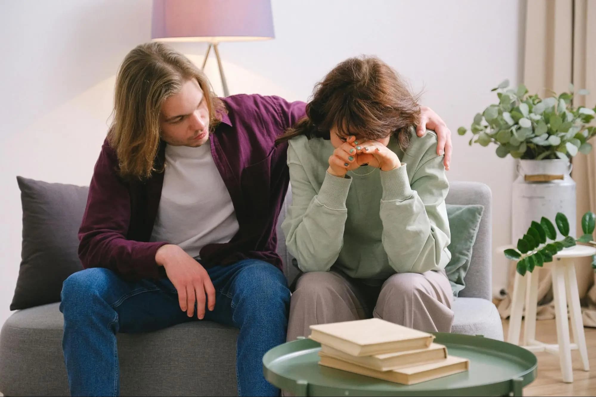 Boyfriend comforting his stressed out girlfriend